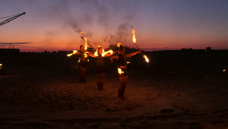 Fire-show.-A-group-of-professional-artists-performs-a-variety-of-fire-facilities.-Boys-and-girls-performed-dances-with-fire-in-the-night-on-the-street-in-the-Park